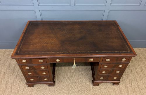fig 2. Flame Mahogany Pedestal Desk by Maple and Co