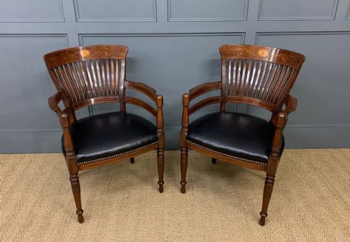 fig 1. Pair of Inlaid Mahogany Desk Armchairs by Maple and Co.