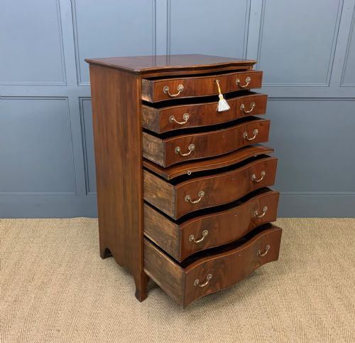 fig 1. Waring and Gillow Tall Flame Mahogany Chest