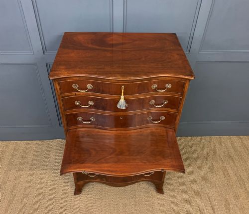 fig 3. Waring and Gillow Tall Flame Mahogany Chest