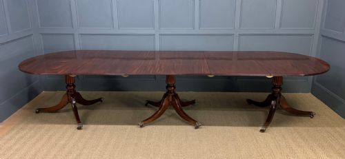 Late 19th Century Figured Mahogany Triple Pillar Dining Table