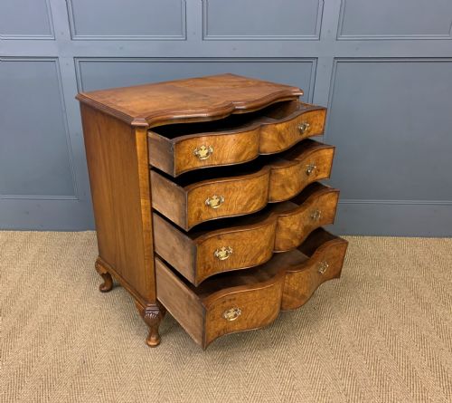 fig 1. Waring and Gillow Burr Walnut Serpentine Chest of Drawers