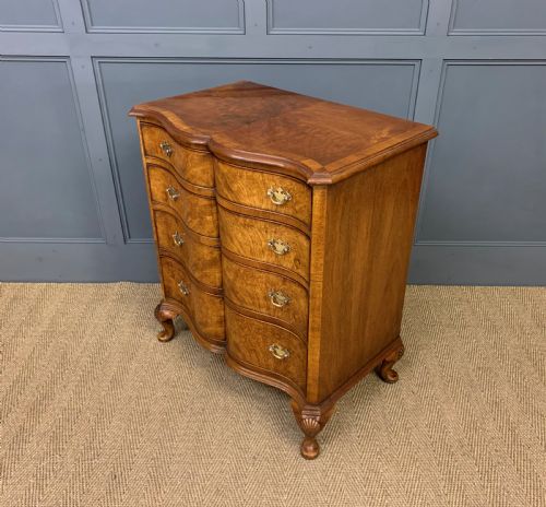 fig 4. Waring and Gillow Burr Walnut Serpentine Chest of Drawers