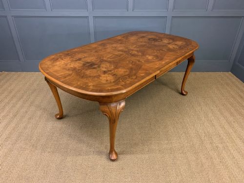 fig 2. Burr Walnut Dining Suite by Maple and Co