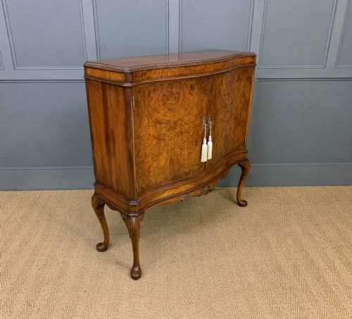 Serpentine Fronted Burr Walnut Cupboard