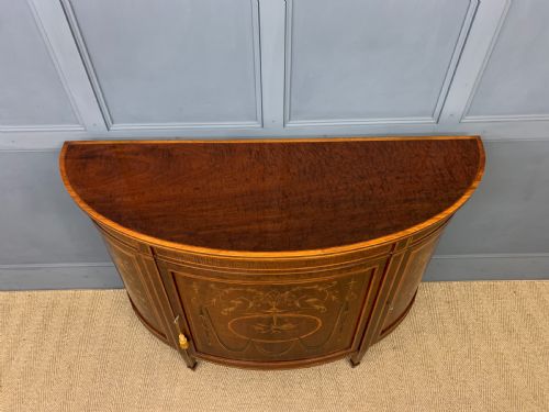 fig 1. Inlaid Mahogany Demi Lune Commode by Druce and Co.