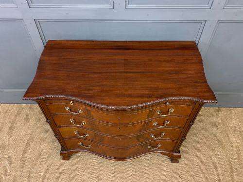 fig 1. Waring and Gillow Serpentine Chest of Drawers