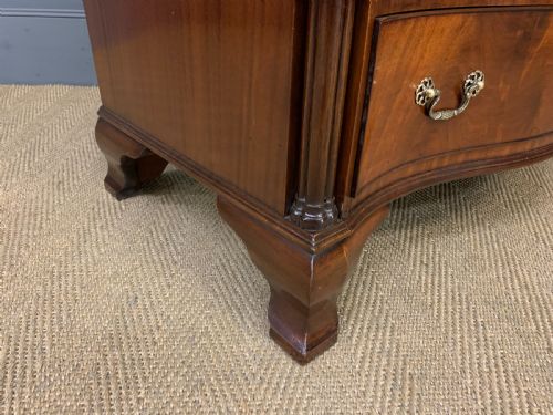 fig 3. Waring and Gillow Serpentine Chest of Drawers