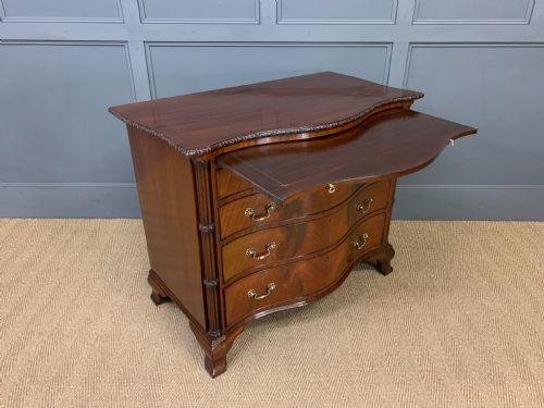 fig 4. Waring and Gillow Serpentine Chest of Drawers