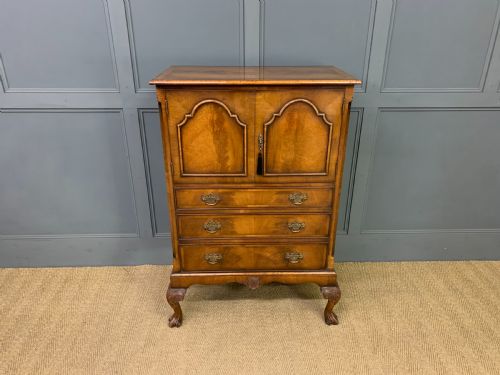 fig 1. Burr Walnut Press Cupboard by Maple and Co