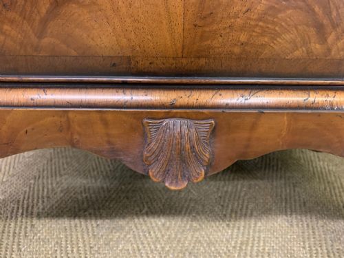 fig 4. Burr Walnut Press Cupboard by Maple and Co