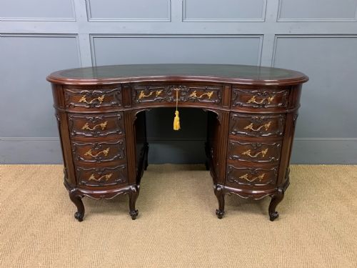 fig 1. Victorian Mahogany Kidney Desk by Maple & Co.