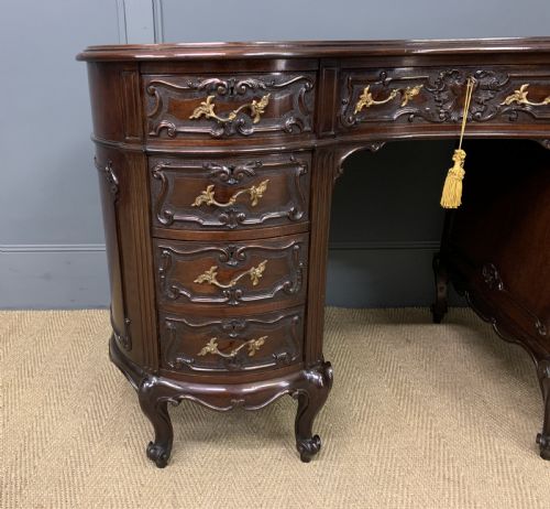 fig 3. Victorian Mahogany Kidney Desk by Maple & Co.