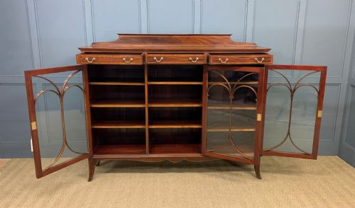 fig 2. Inlaid Mahogany Bookcase by Maple & Co.