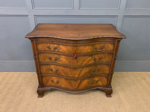 Serpentine Chest of Drawers by Waring and Gillow