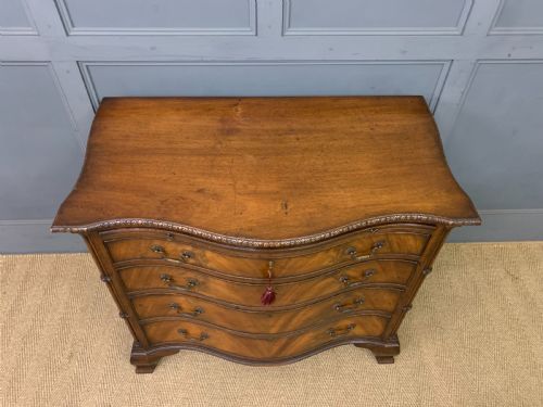 fig 2. Serpentine Chest of Drawers by Waring and Gillow