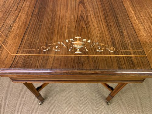 fig 3. Inlaid Rosewood Table by Maple & Co.