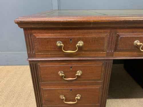 fig 4. Walnut Partners Pedestal Desk by Maple & Co.