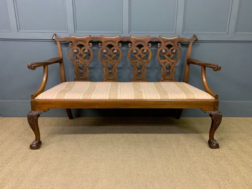 CHIPPENDALE STYLE CARVED MAHOGANY SETTEE - ADDITIONAL PHOTO 4