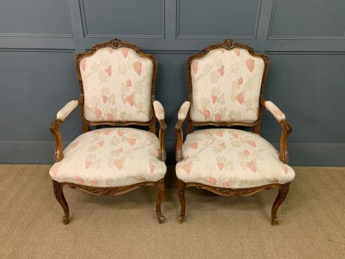 Pair of French Carved Walnut Armchairs