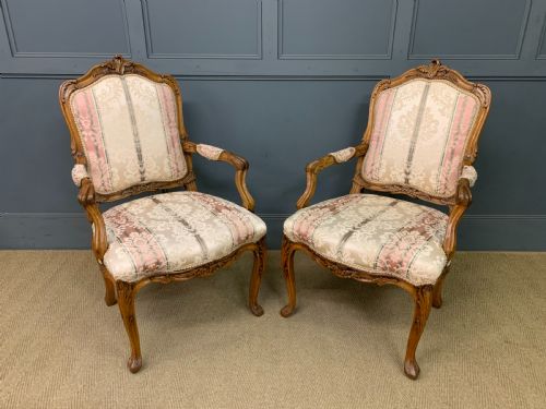 Pair of French Carved Walnut Armchairs