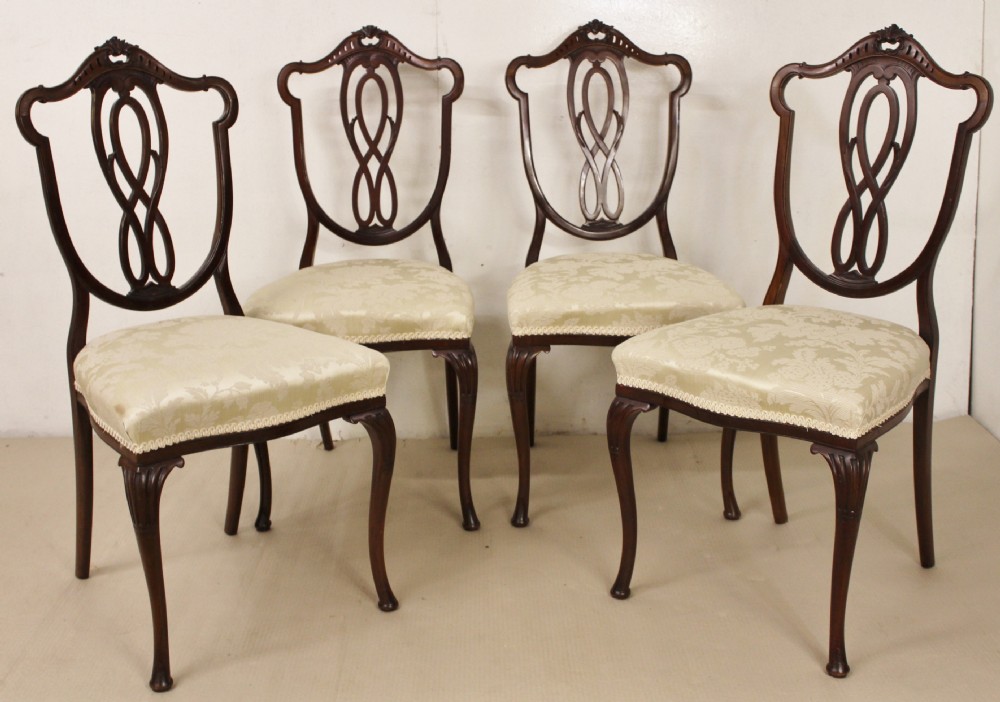 Set of Four Chairs by Jas. Shoolbred and Co.