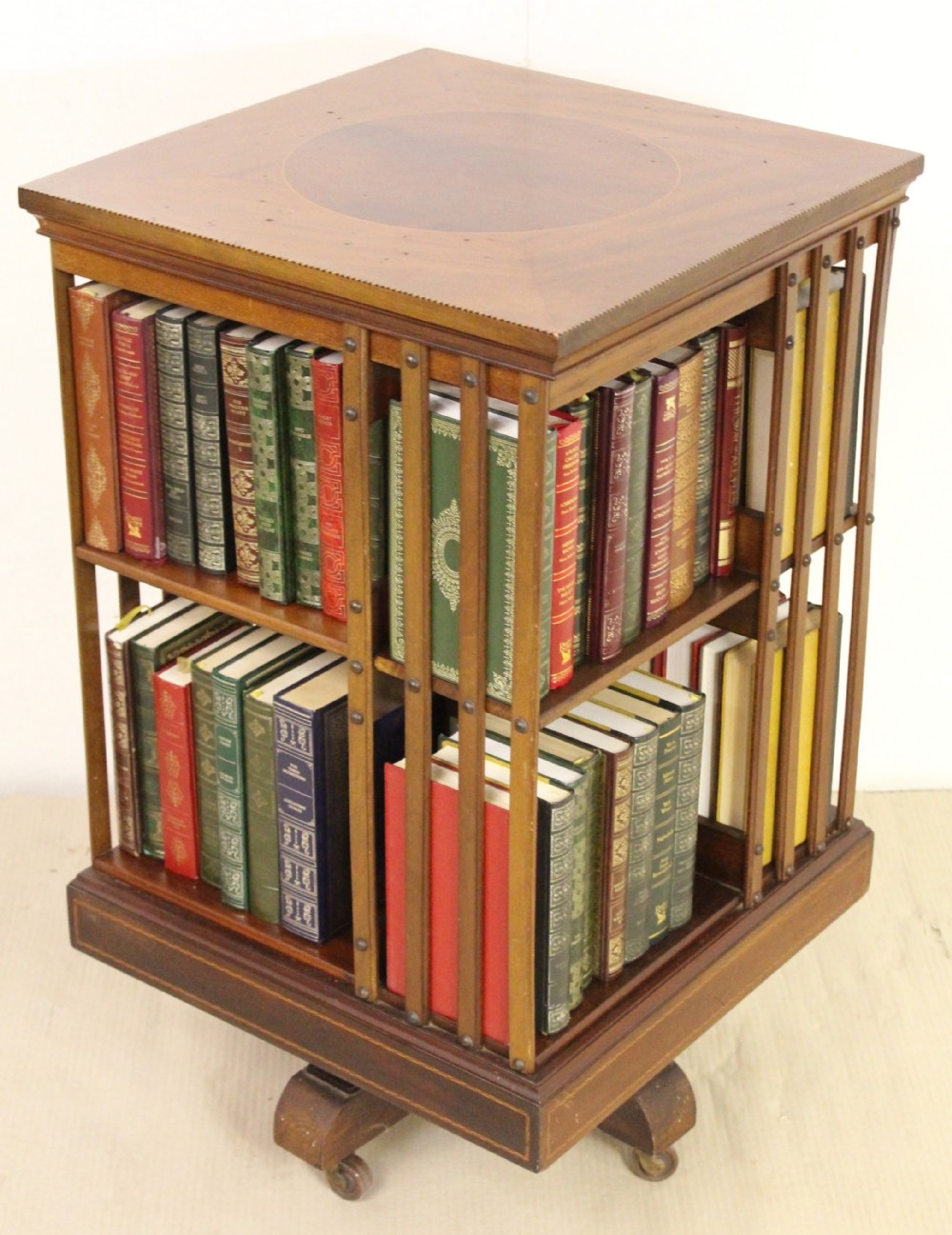 Inlaid Mahogany Revolving Bookcase by Maple and Co