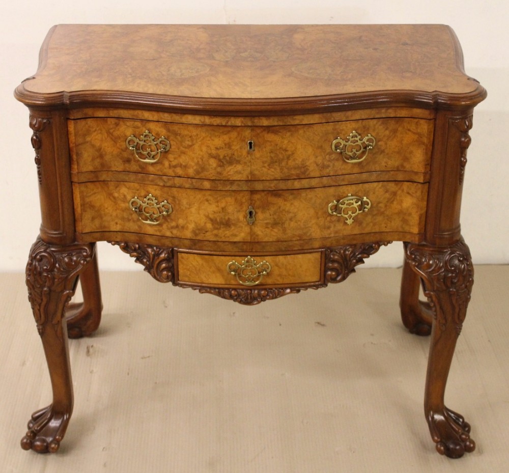Serpentine Burr Walnut Lowboy
