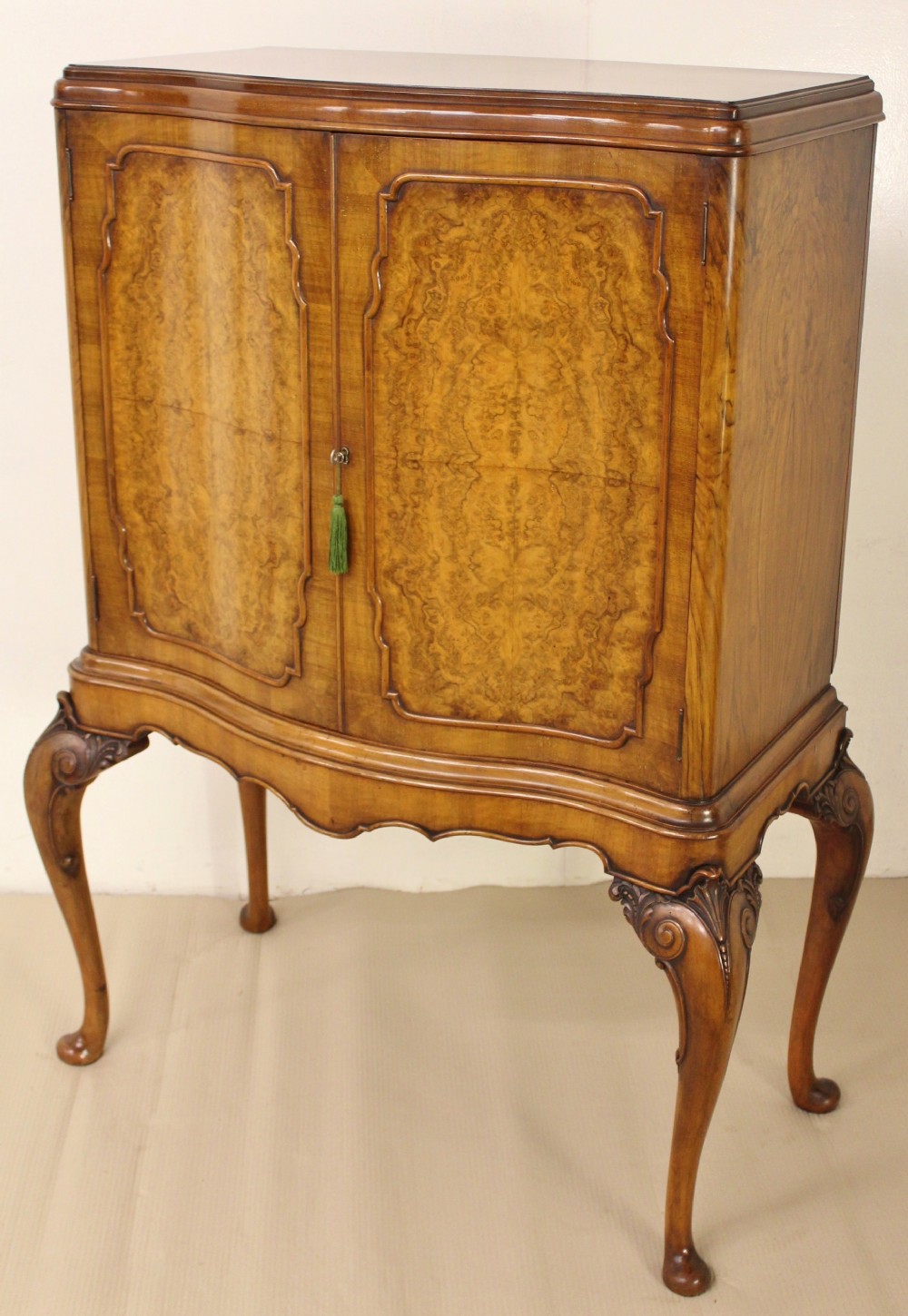 Serpentine Burr Walnut Cabinet on Stand