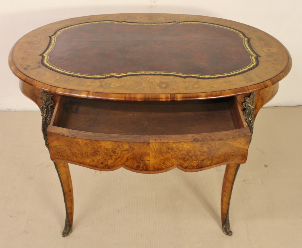 Victorian Oval Burr Walnut and Marquetry Writing Table View II