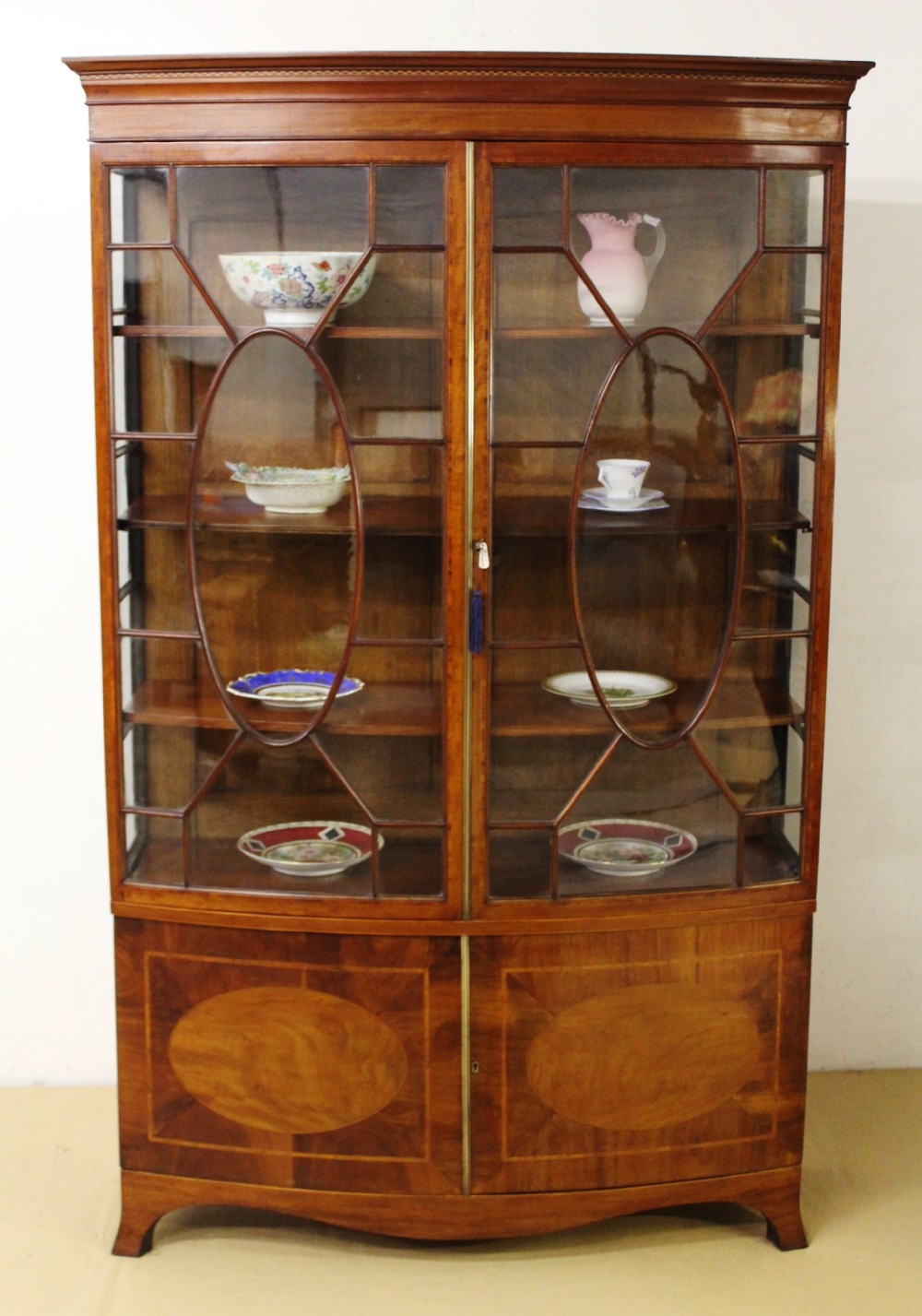 Maple and Co Bow Fronted Display Cabinet