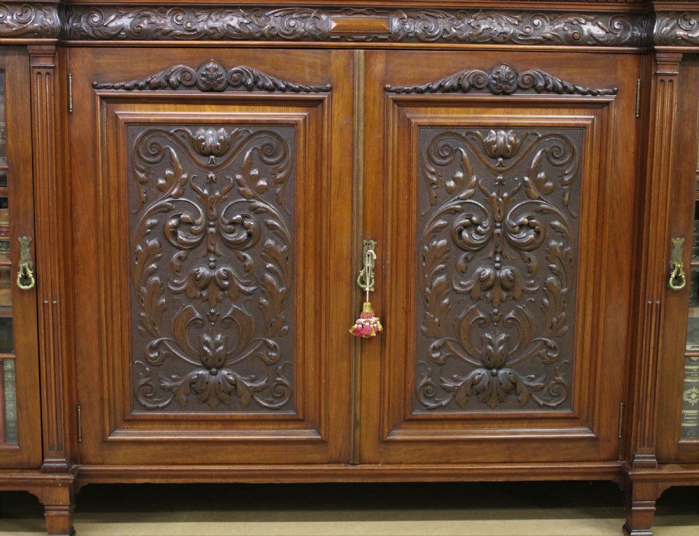 Long Victorian Carved Walnut Bookcase by Maple and Co.  View III