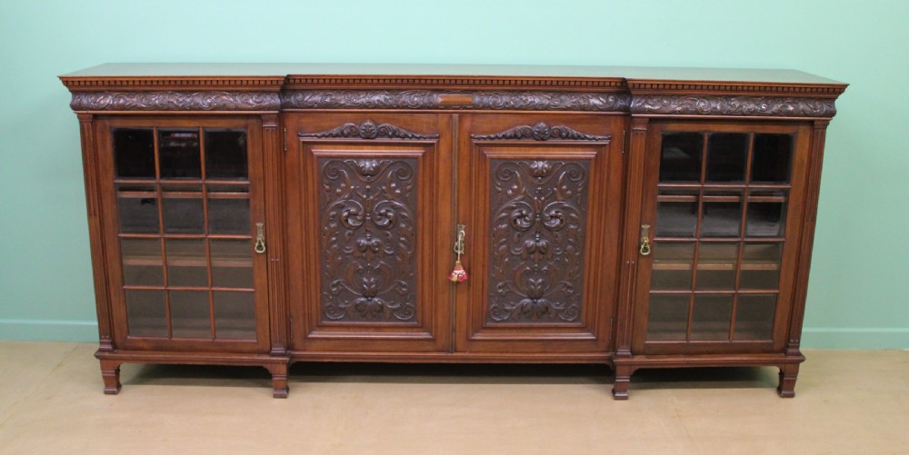 Long Victorian Carved Walnut Bookcase by Maple and Co.  View VI