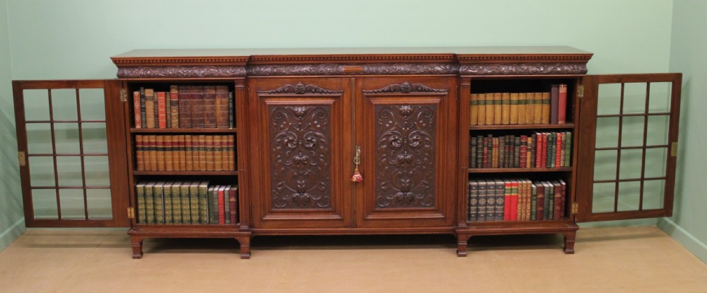 Long Victorian Carved Walnut Bookcase by Maple and Co.  View IX