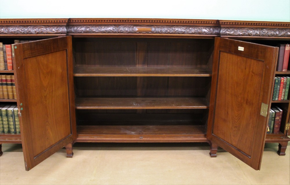 Long Victorian Carved Walnut Bookcase by Maple and Co.  View XI