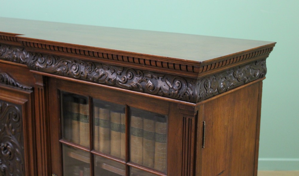 Long Victorian Carved Walnut Bookcase by Maple and Co.  View XVIII