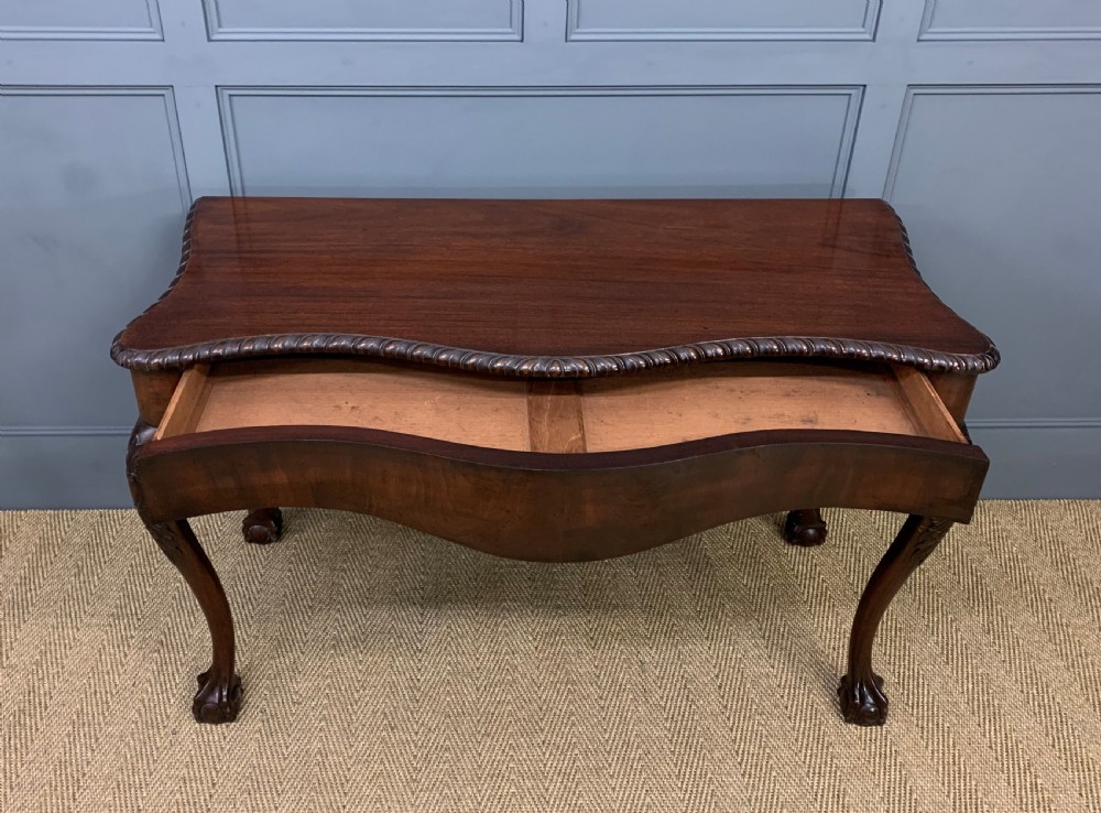 Chippendale Style Serpentine Shaped Mahogany Table View VII