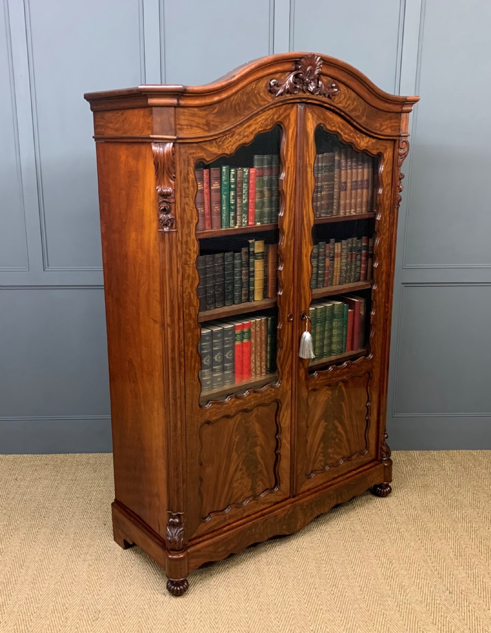 French 19th Century Flame Mahogany Bookcase