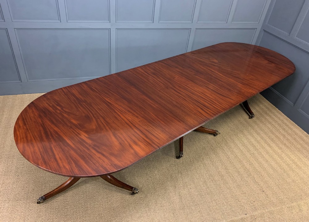 Late 19th Century Figured Mahogany Triple Pillar Dining Table View IV