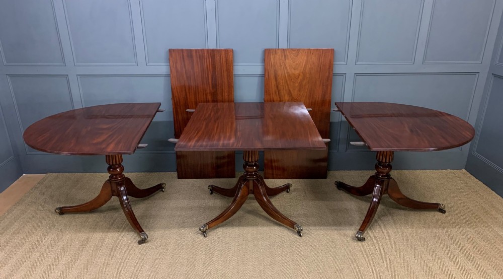 Late 19th Century Figured Mahogany Triple Pillar Dining Table View V