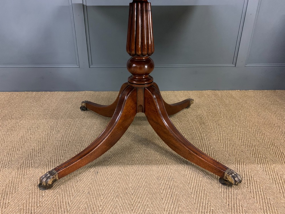 Late 19th Century Figured Mahogany Triple Pillar Dining Table View IX