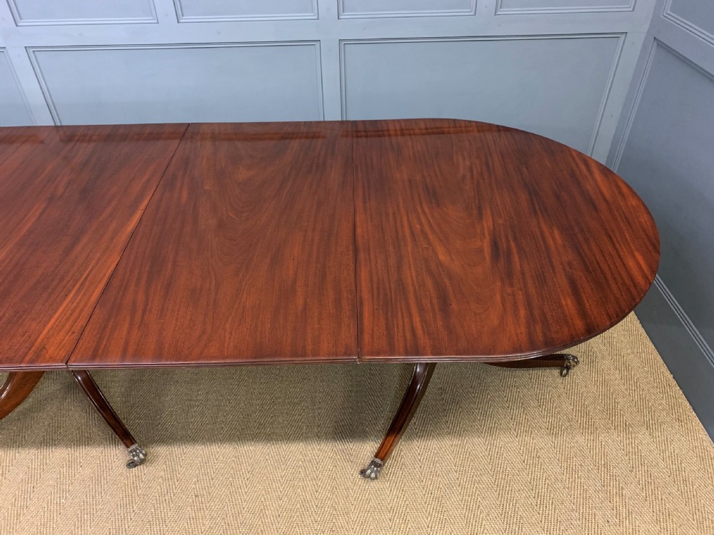 Late 19th Century Figured Mahogany Triple Pillar Dining Table View XIII