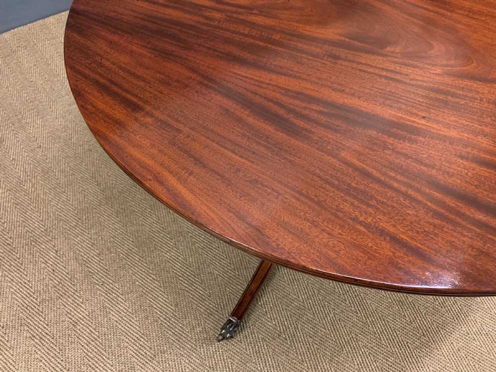 Late 19th Century Figured Mahogany Triple Pillar Dining Table View XVIII