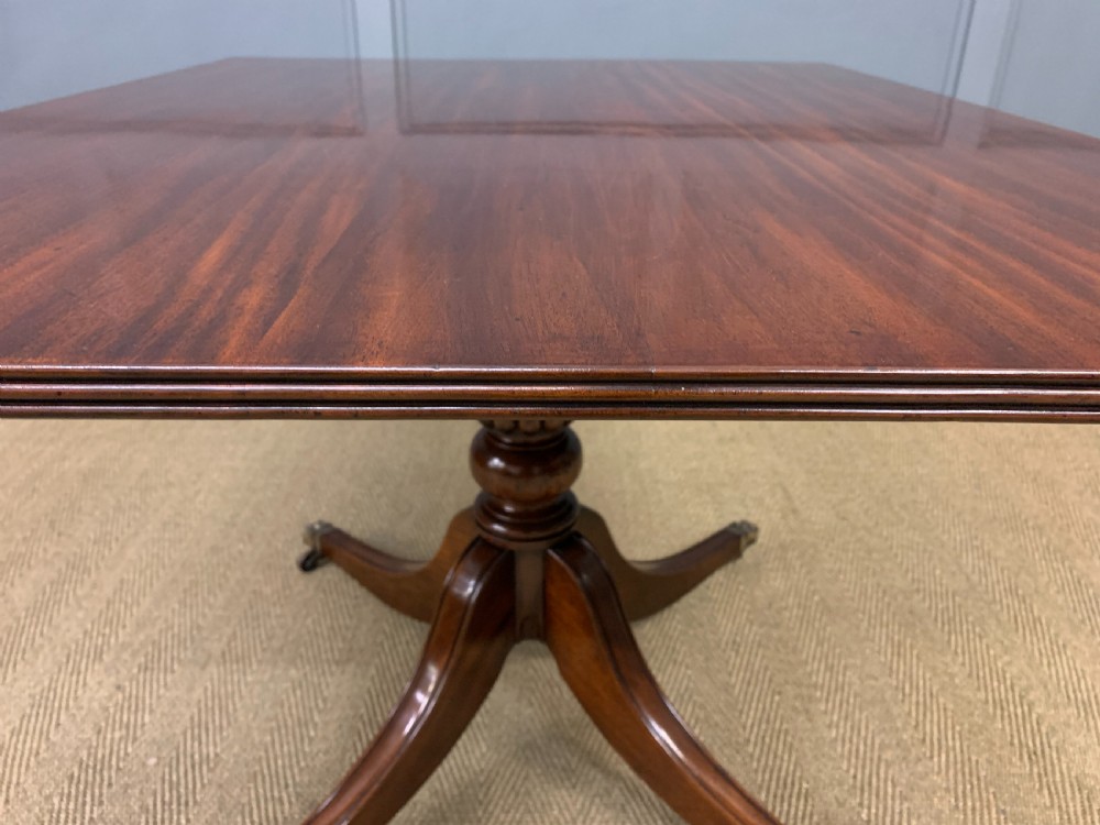 Late 19th Century Figured Mahogany Triple Pillar Dining Table View XXIII