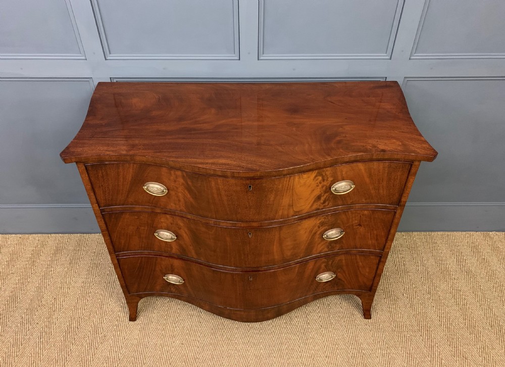 Georgian Flame Mahogany Serpentine Chest of Drawers View II
