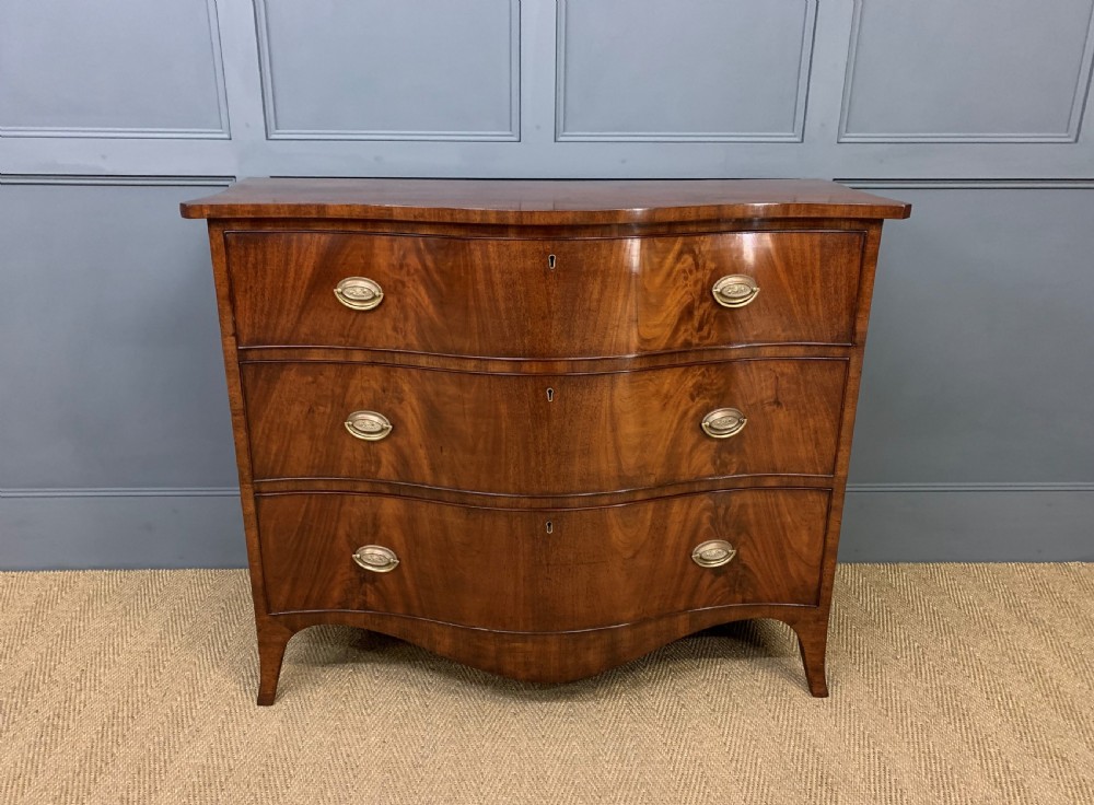 Georgian Flame Mahogany Serpentine Chest of Drawers View VI