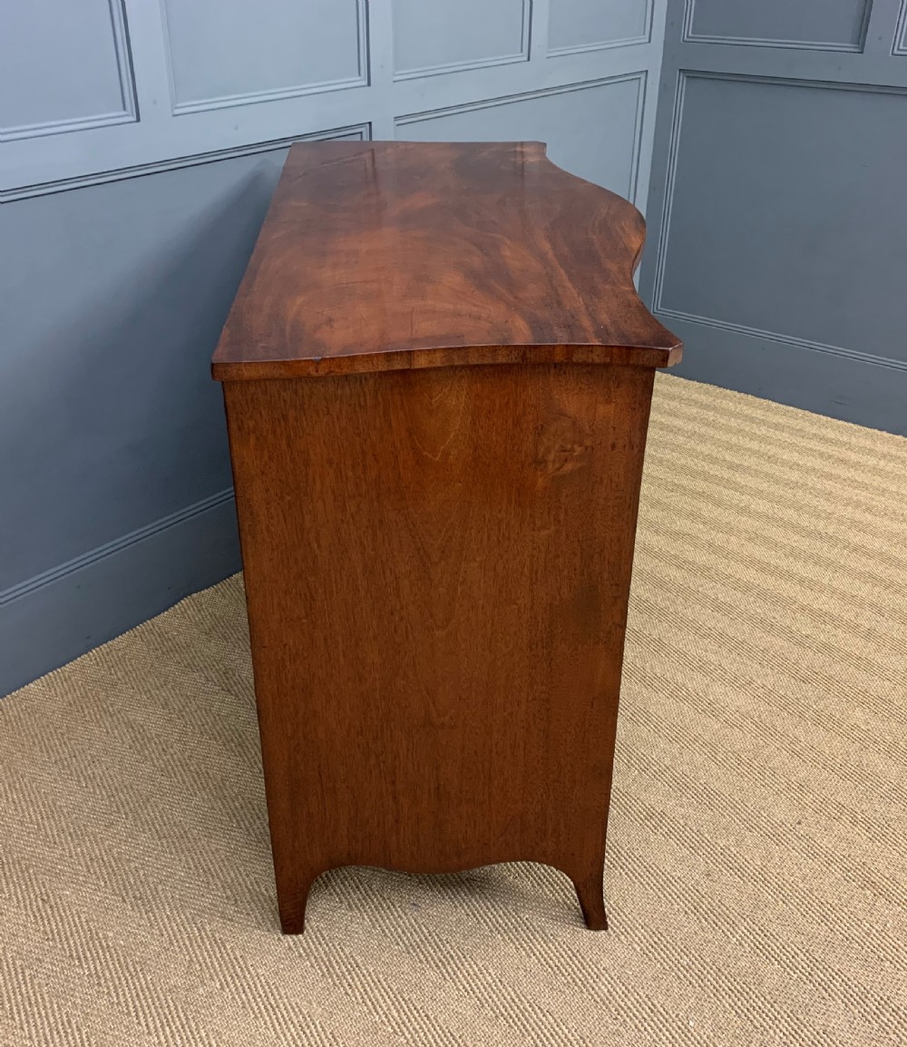 Georgian Flame Mahogany Serpentine Chest of Drawers View XI