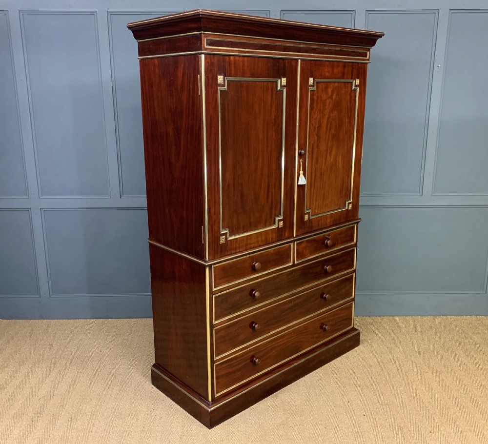 Early 19th Century Brass Mounted Flame Mahogany Linen Press View III