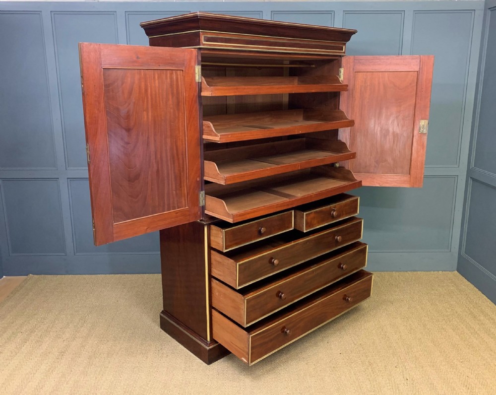Early 19th Century Brass Mounted Flame Mahogany Linen Press View IV