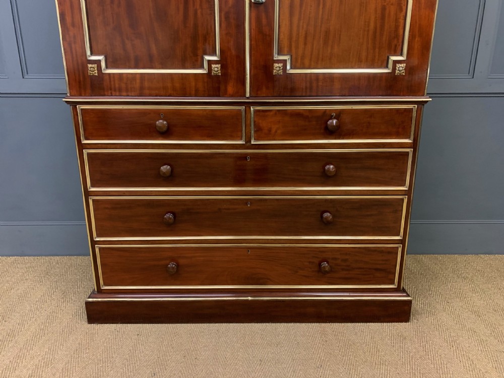Early 19th Century Brass Mounted Flame Mahogany Linen Press View VI